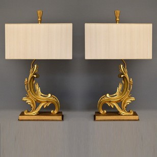 Pair of antique andirons as lamps.